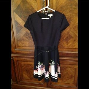 Ted Baker London black and print cap sleeve dress.